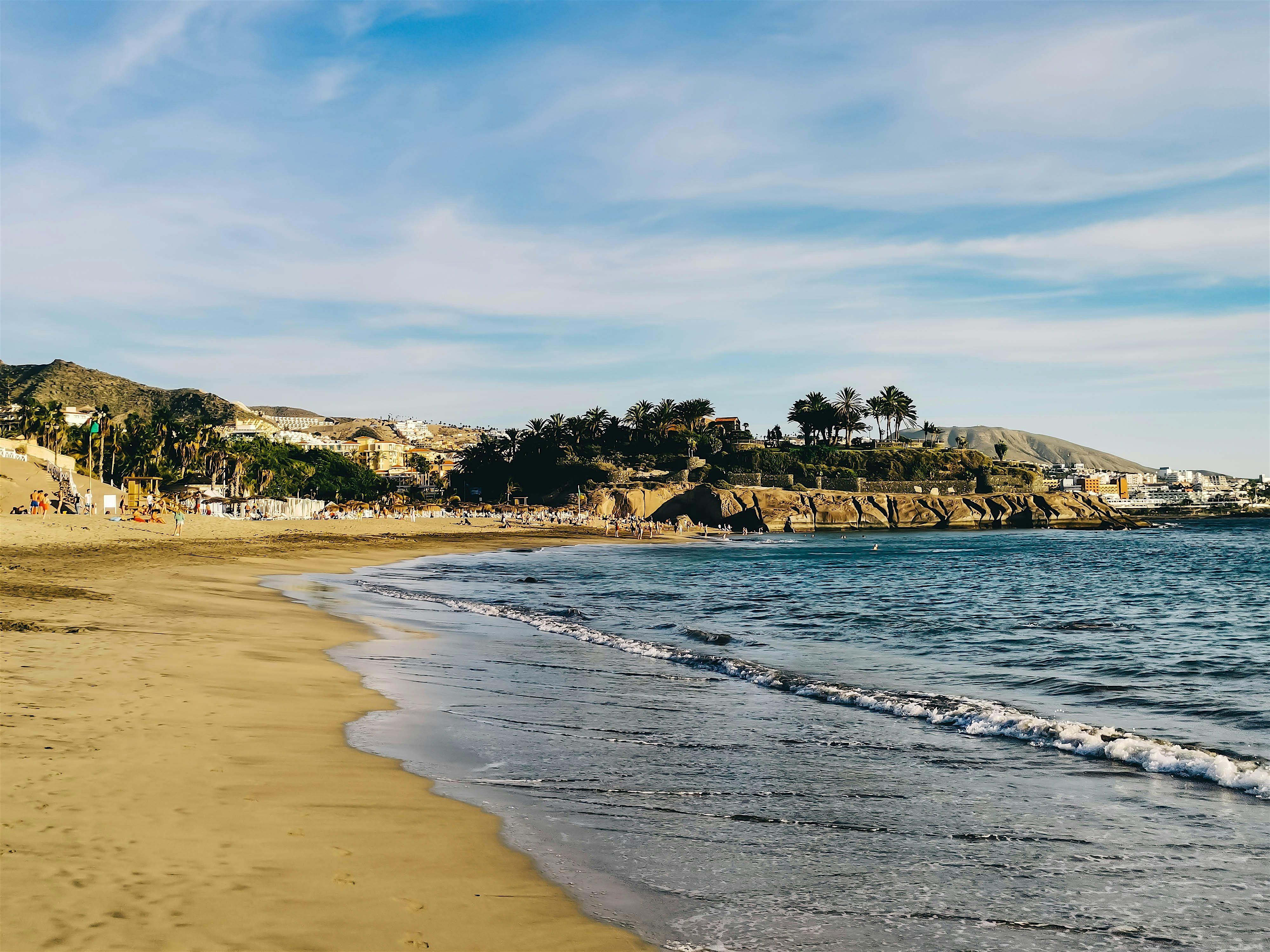 Playa del Duque beach golden sand and crystal-clear calm water