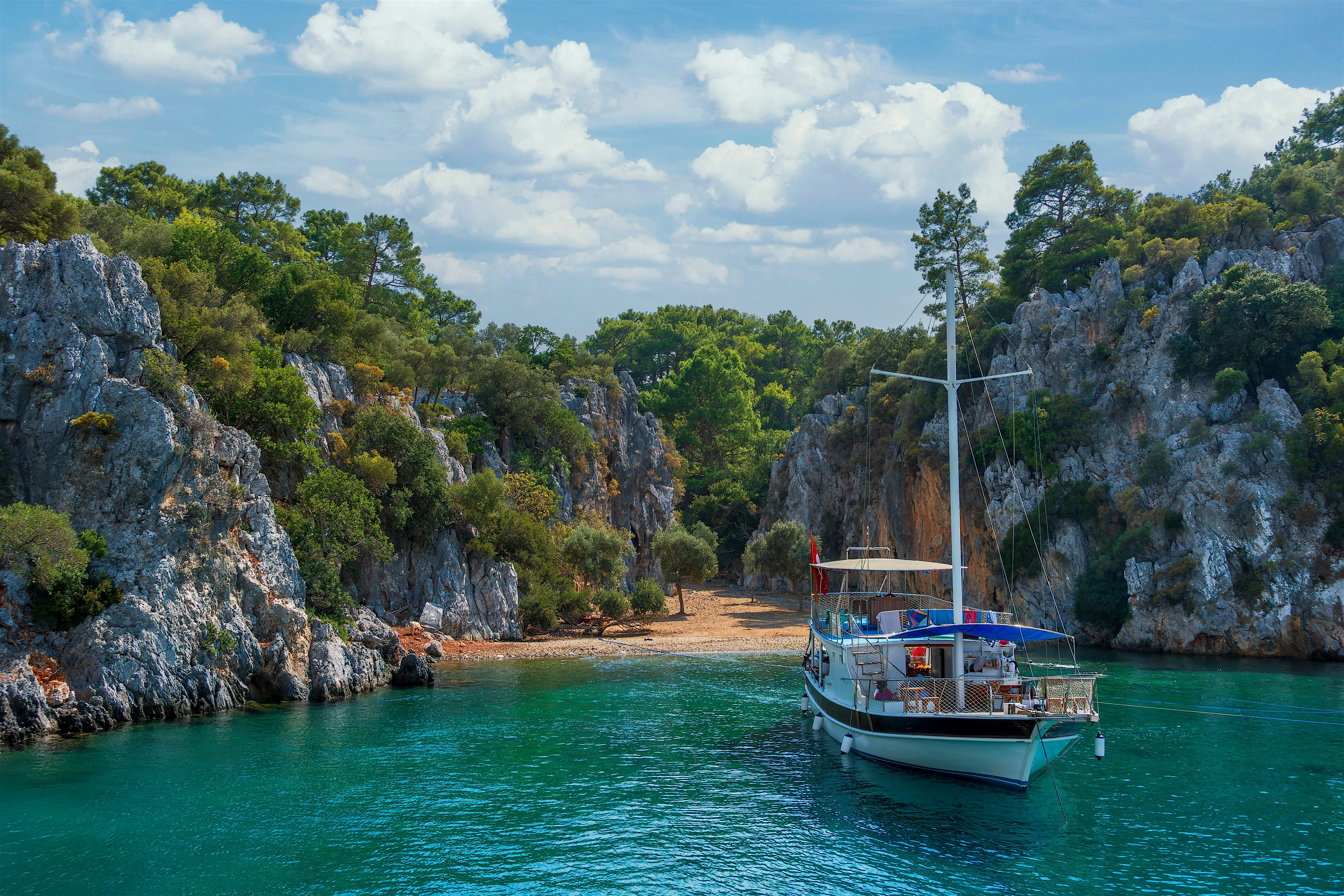 Boat anchored in a small bay