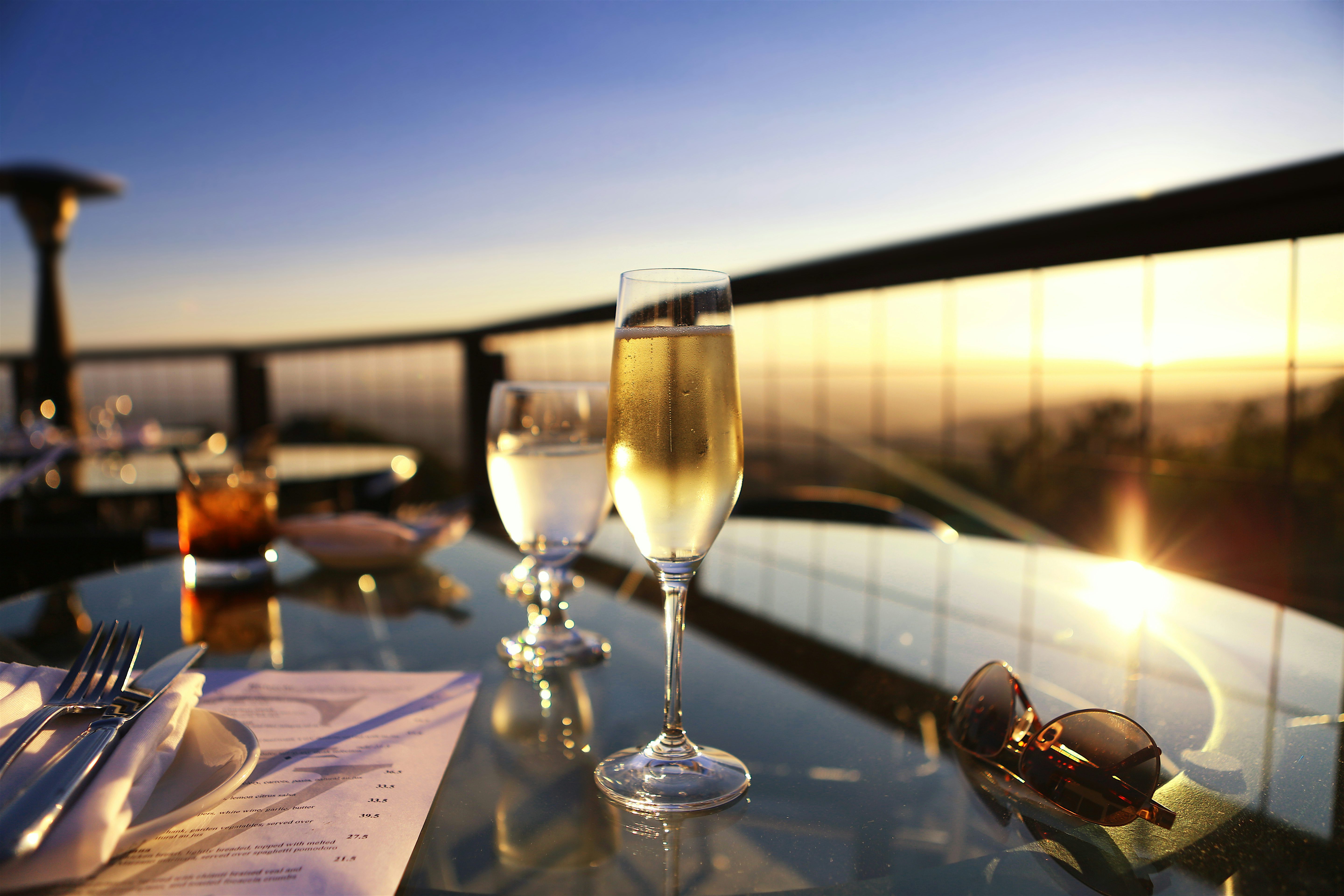 Glass of champagne on a rooftop bar