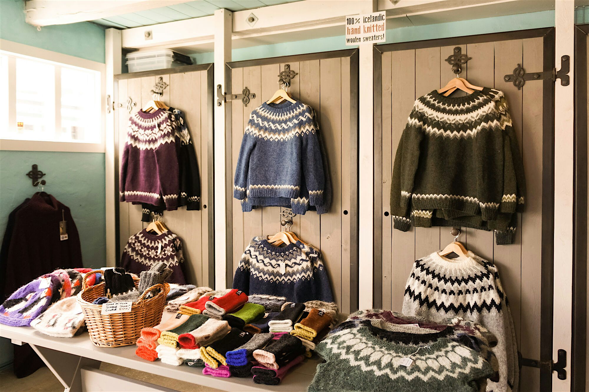 Shop interior with traditional Icelandic wool jumpers, hats and gloves