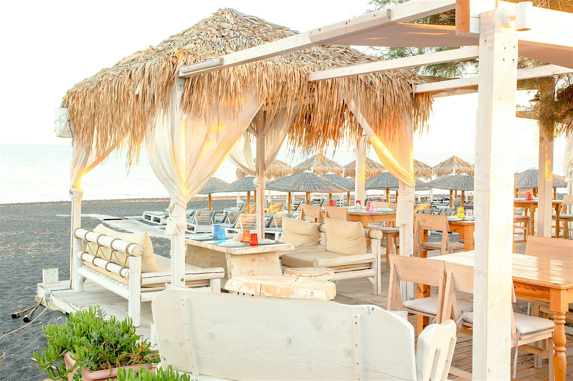 Tables on an open beach bar