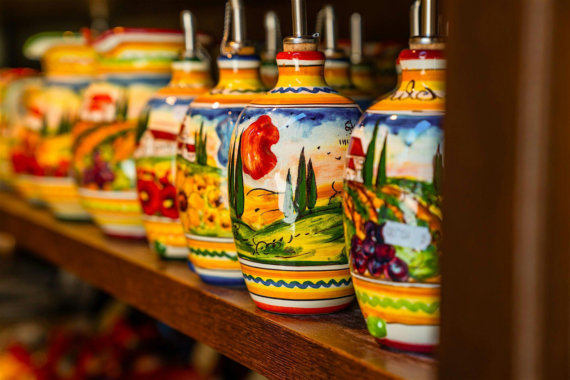 Handmade and painted pottery with bold colours and designs