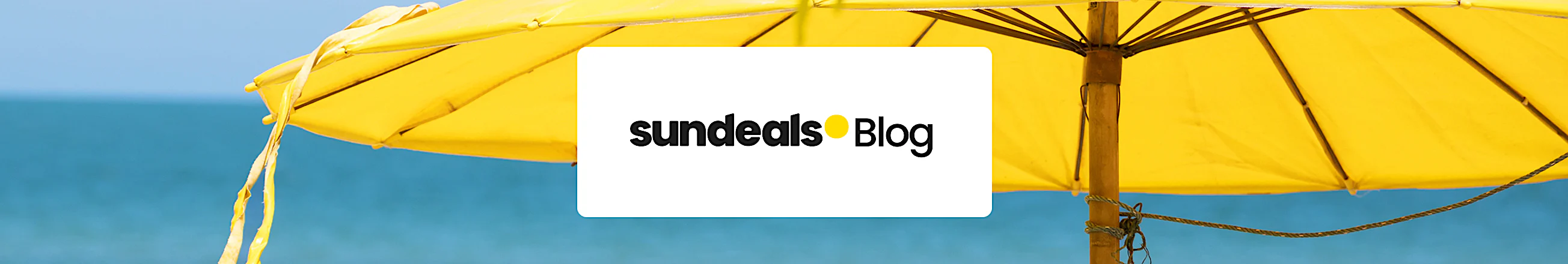 Yellow parasol with text reading Sundeals Blog