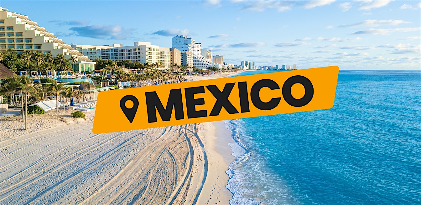 Mexico all inclusive beach holiday with resorts, palm trees and turquoise ocean coastline