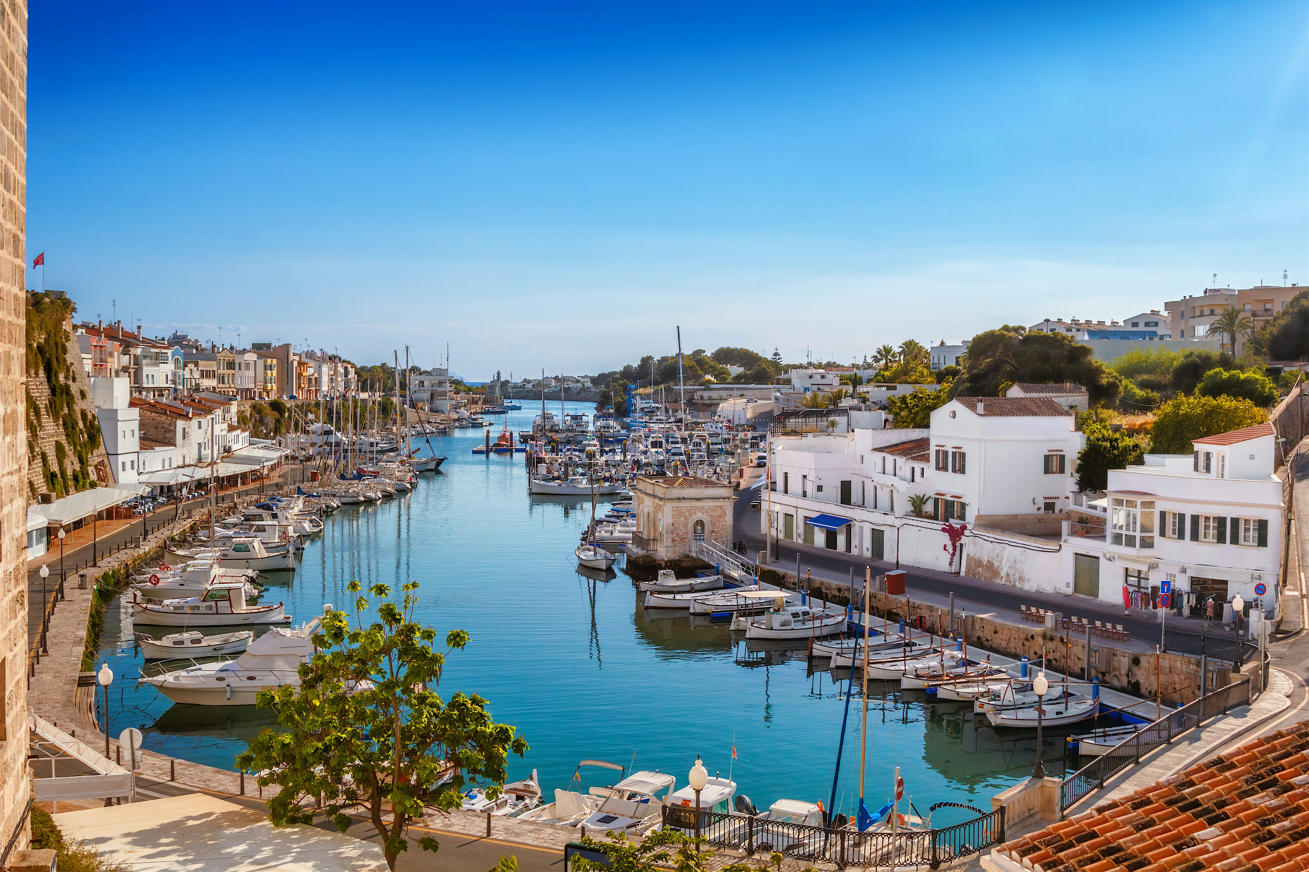 View on old town Ciutadella sea port on sunny day, Menorca island,