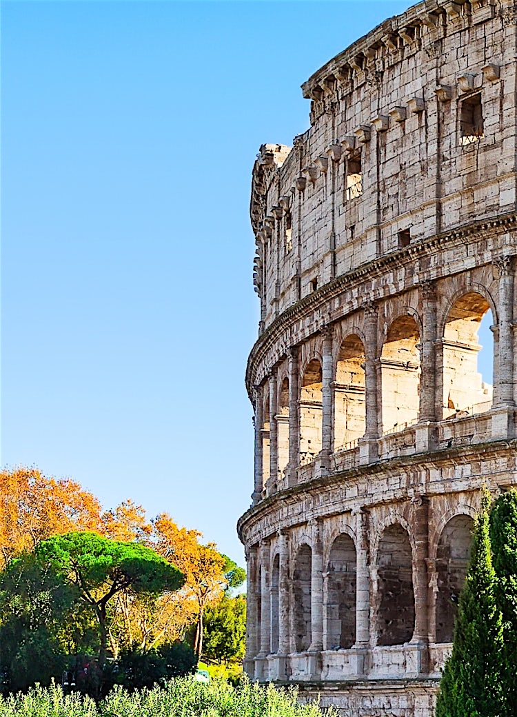 Rome Colosseum landmark with ancient Roman architecture, historic stone arches and iconic Italian heritage site.