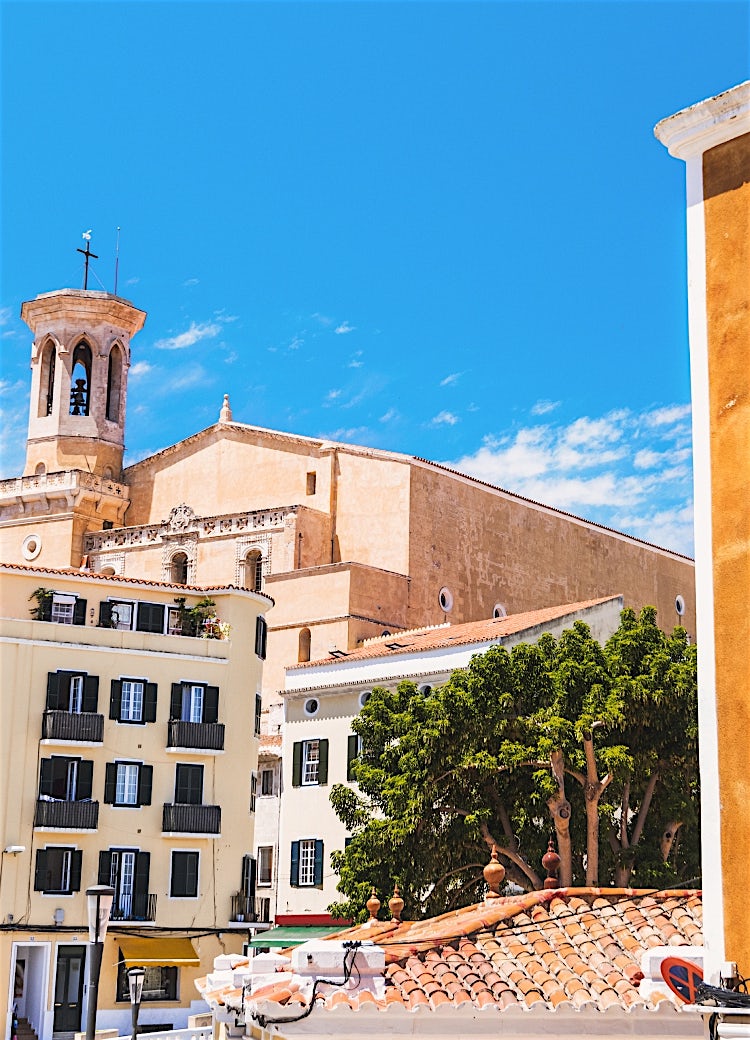 Historic Ciutadella architecture and church bell tower in Menorca, Balearic Islands, Spain.