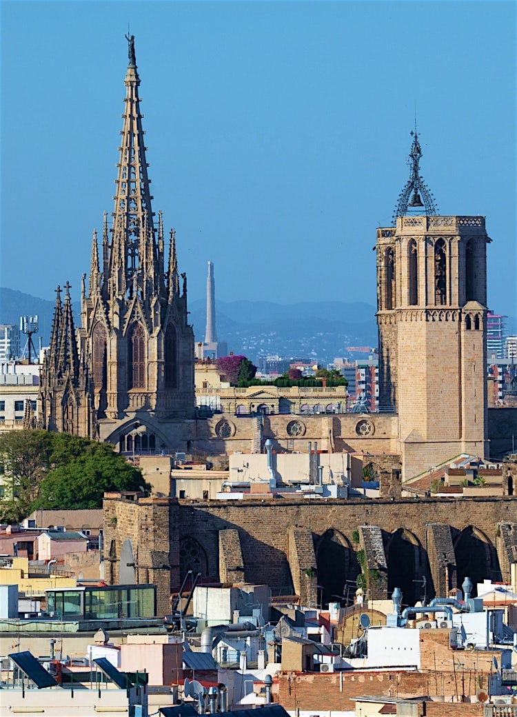 Barcelona Cathedral and Gothic Quarter skyline in Barcelona, Spain, featuring historic Gothic spires, medieval architecture and panoramic city rooftop views.