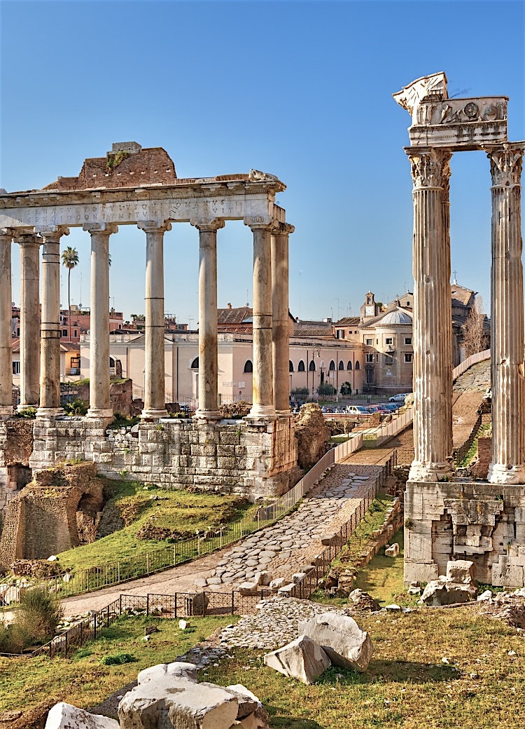 Roman Forum, Rome, Italy, featuring ancient Roman temple columns, archaeological ruins, and historic UNESCO World Heritage landmarks.