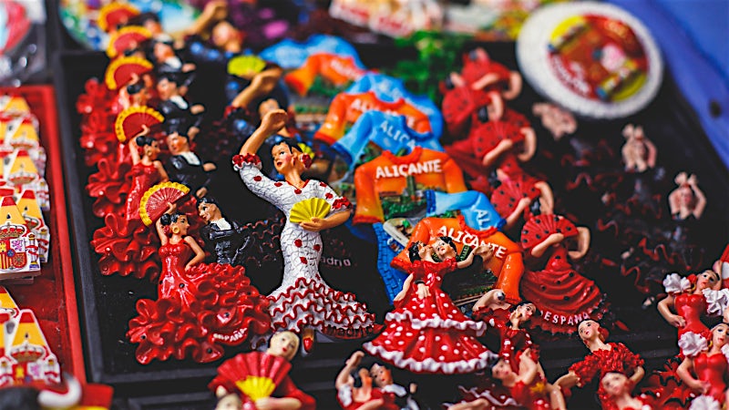 Spanish flamenco souvenir magnets with traditional dancers, vibrant red dresses, fans and Alicante-themed cultural keepsakes.