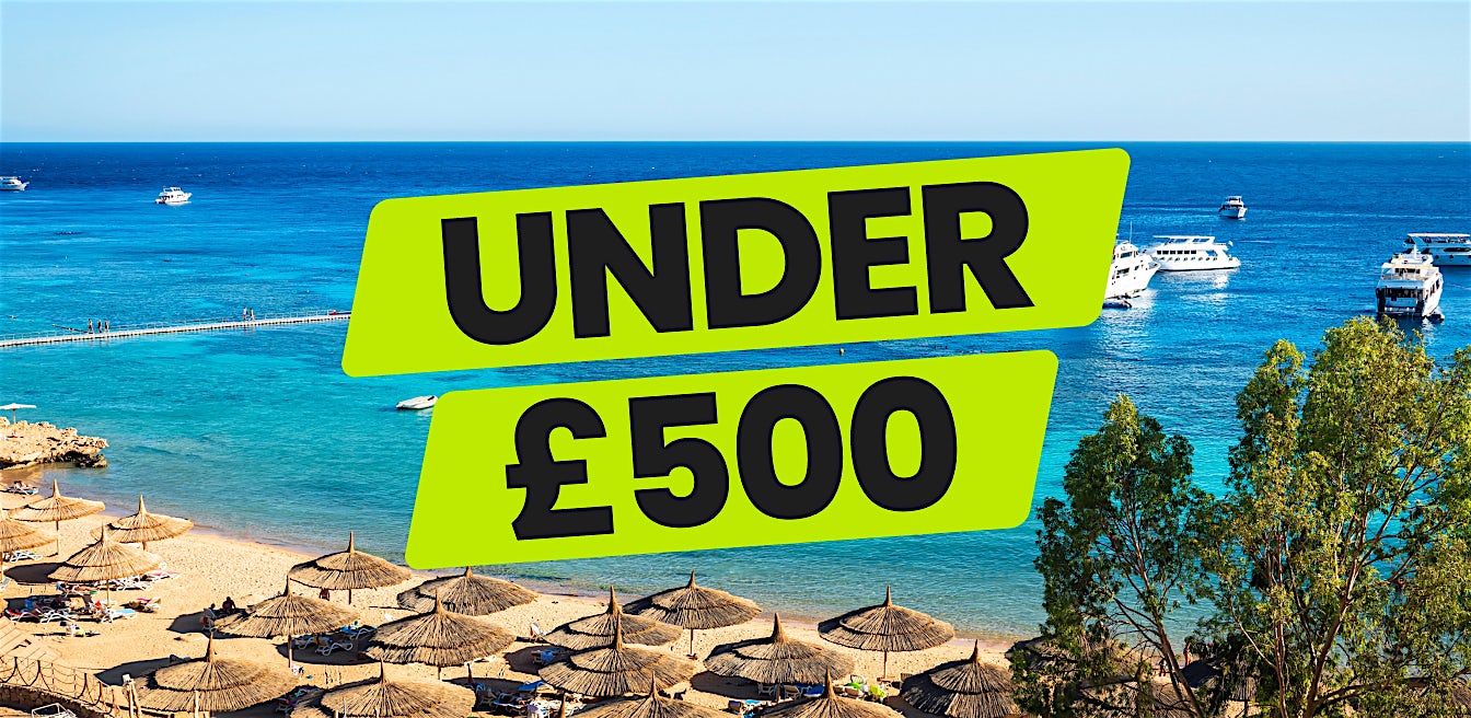 Stunning beach resort with sun loungers and turquoise waters, perfect for affordable holidays under £500 and summer escapes with Sundeals.