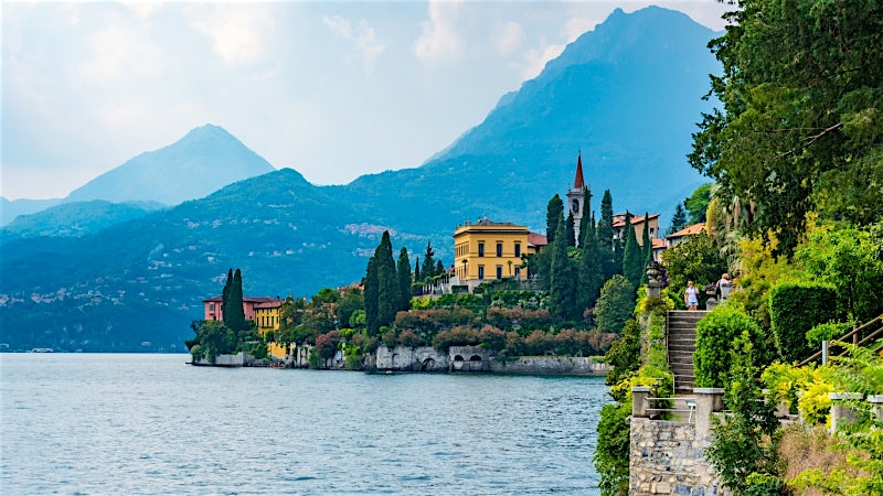 Lakeside villas, gardens and mountain scenery on Lake Como, Varenna, Italy.