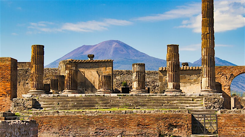 Ancient Pompeii ruins with Mount Vesuvius in the background, Italy.
