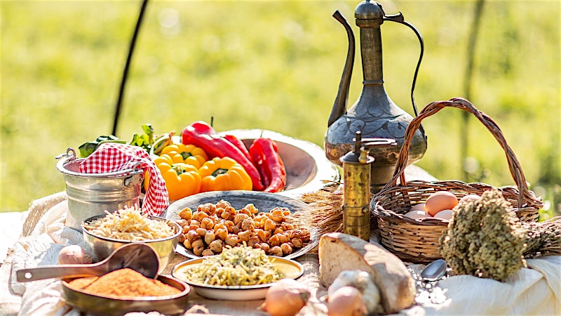 Traditional Turkish cuisine with fresh vegetables, bread and local dishes.