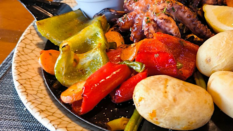 Traditional Tenerife seafood served with colourful vegetables and Canarian potatoes, showcasing local flavours on Value holidays.