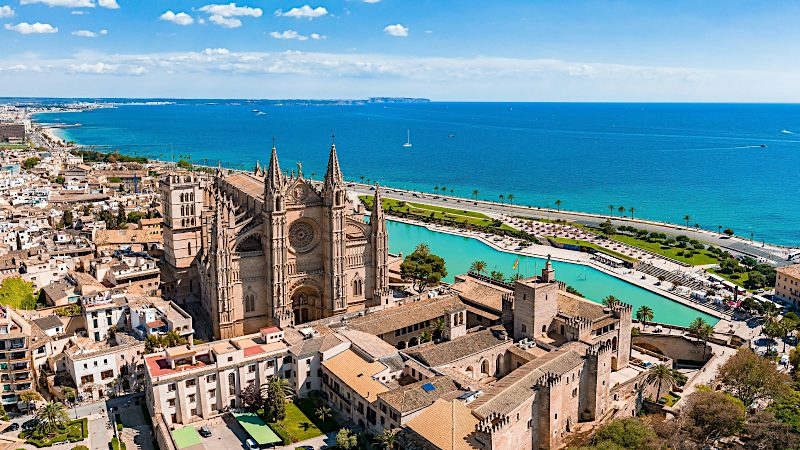 Palma Cathedral and historic old town overlooking Mallorca’s Mediterranean coastline.